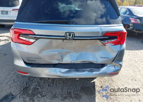 2021 Honda Odyssey Touring from USA, damaged, VIN 5FNRL6H85MB042750